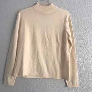 The works Saks 5th Ave Sweater.